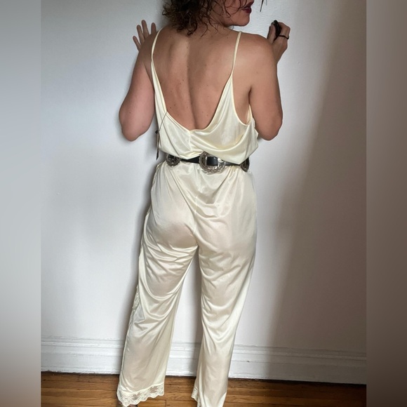 Lingerie jumpsuit made of nylon and lace with cute ties on the side. Open size. - Picture 7 of 14